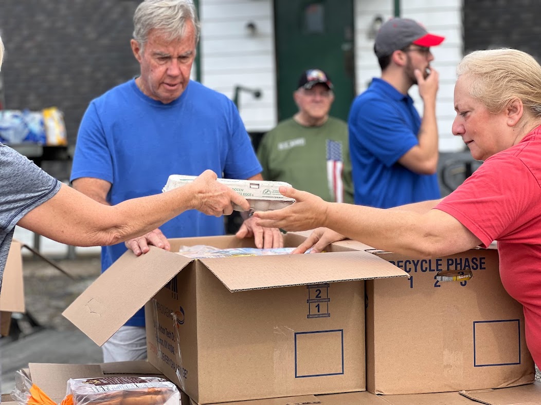 MaryVolunteersAtMasterProvisionsMobileFoodPantry